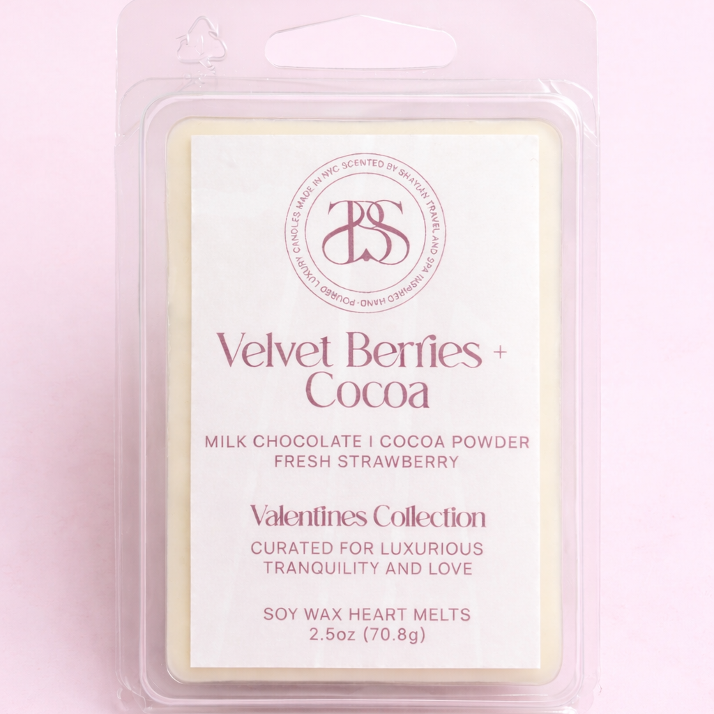 Velvet Berries + Cocoa wax melt packaging on a pink background
